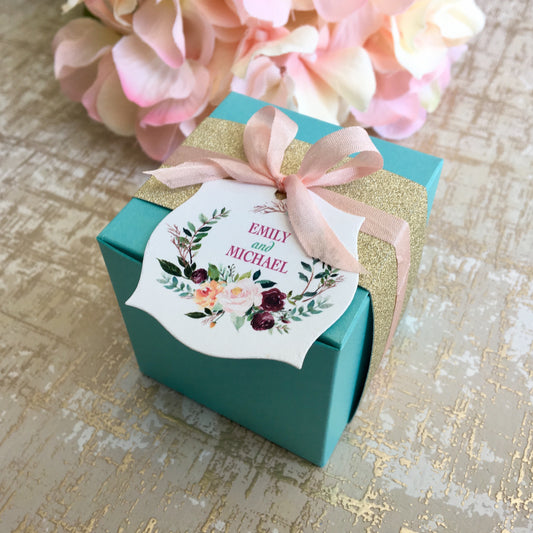 Square Favor boxes with Customizable Tags and Color Ribbons.